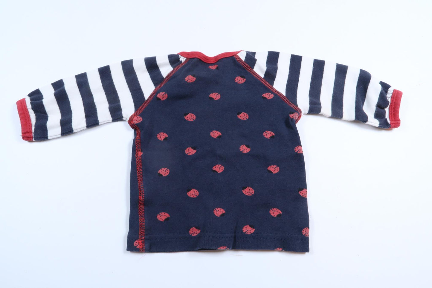 Marineblaues Langarmhemd mit Marienkäfermuster von Kappahl in Größe 62