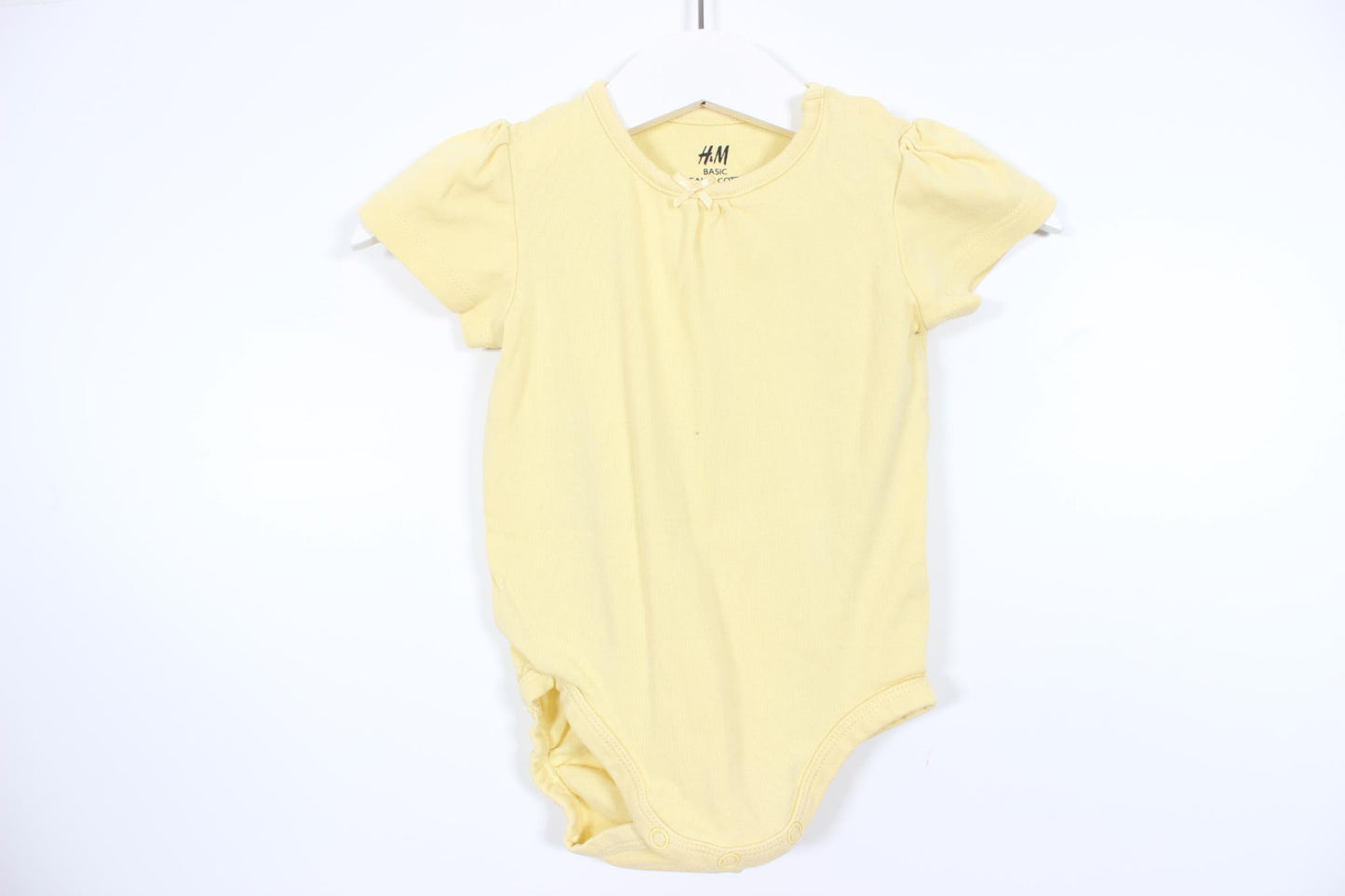 Yellow short-sleeved bodysuit from H&amp;M in size 74