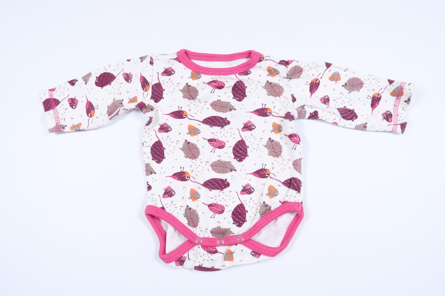 White long-sleeved bodysuit with animals from Minikids in size 50/56