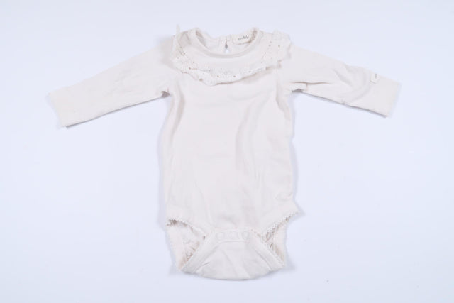 White long-sleeved bodysuit with lace detail from Newbie in size 56