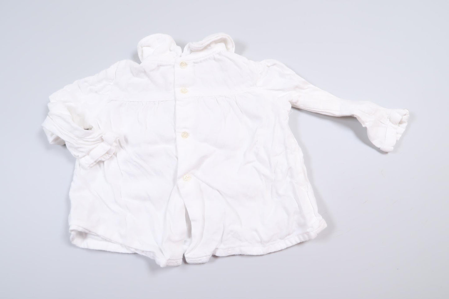 White long-sleeved blouse from Zara in size 68