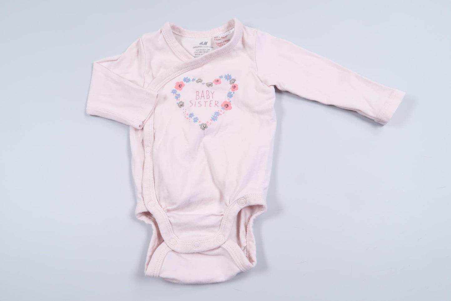 Pink long-sleeved wrap bodysuit "Baby Sister" from H&amp;M in size 56