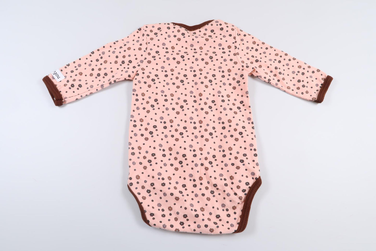 Brand new! Pink floral long-sleeved bodysuit from Just4You in size 50/56