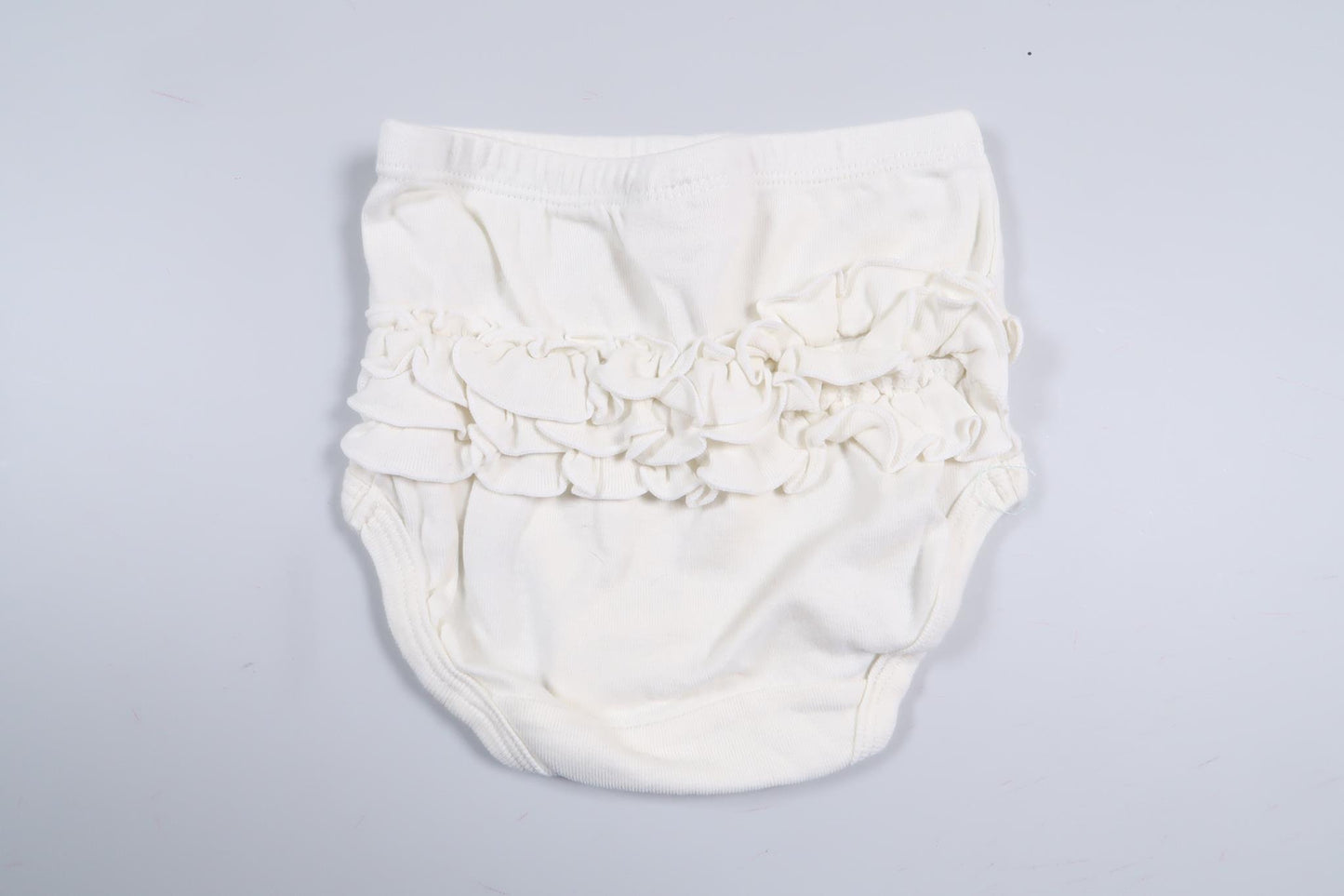 White diaper pants with ruffles from Lindex in size 50/56