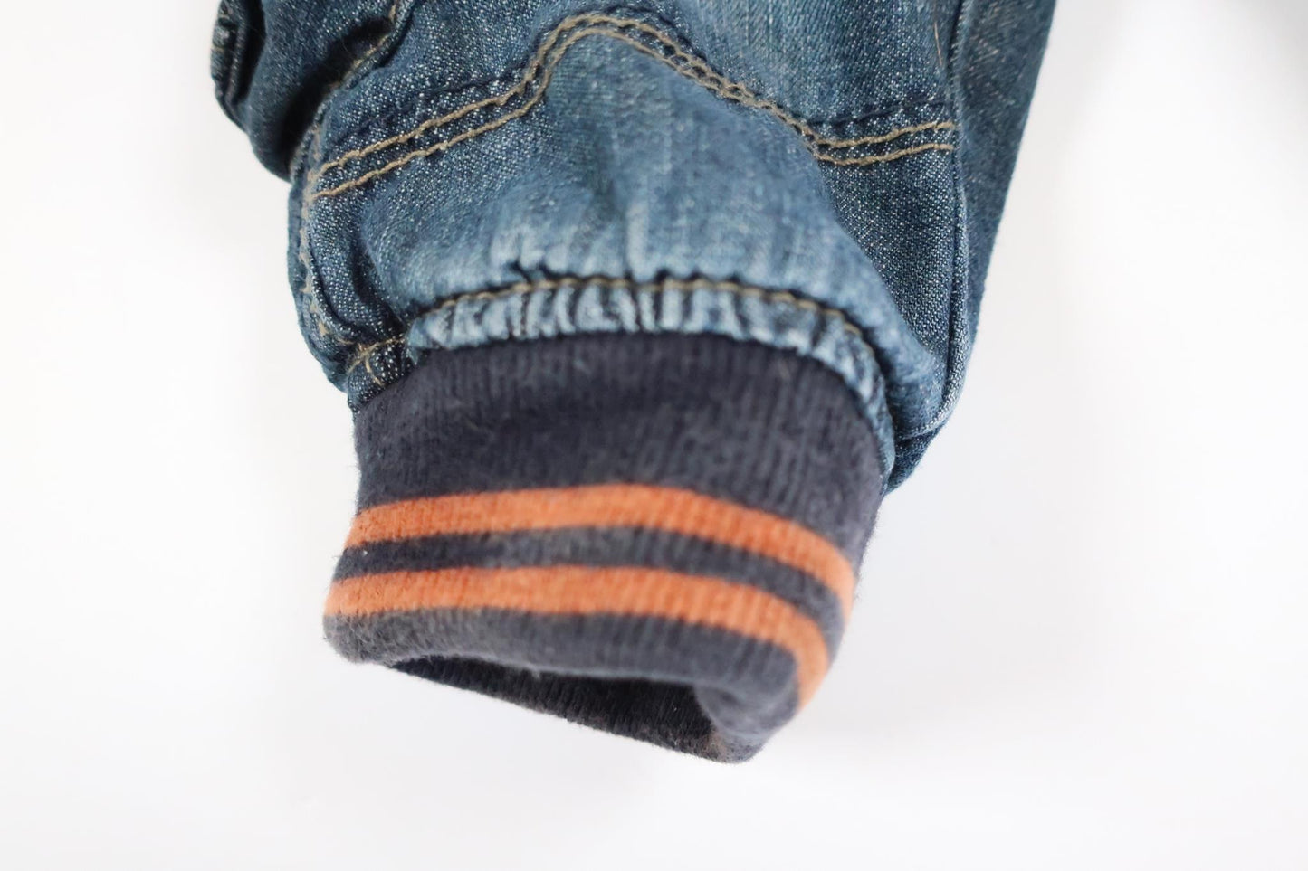 Put on lightly lined jeans from Early Days in size 3-6 M.
