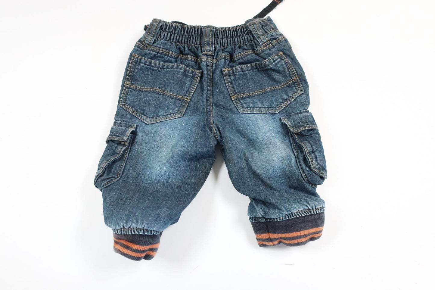 Put on lightly lined jeans from Early Days in size 3-6 M.