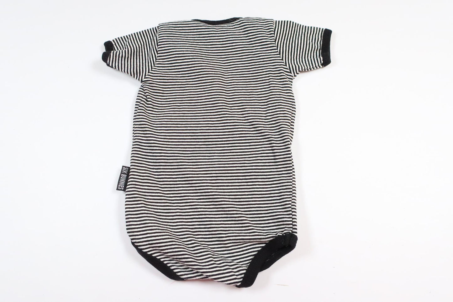 Striped black short-sleeved bodysuit from Six Bunnies in size 0-3 M