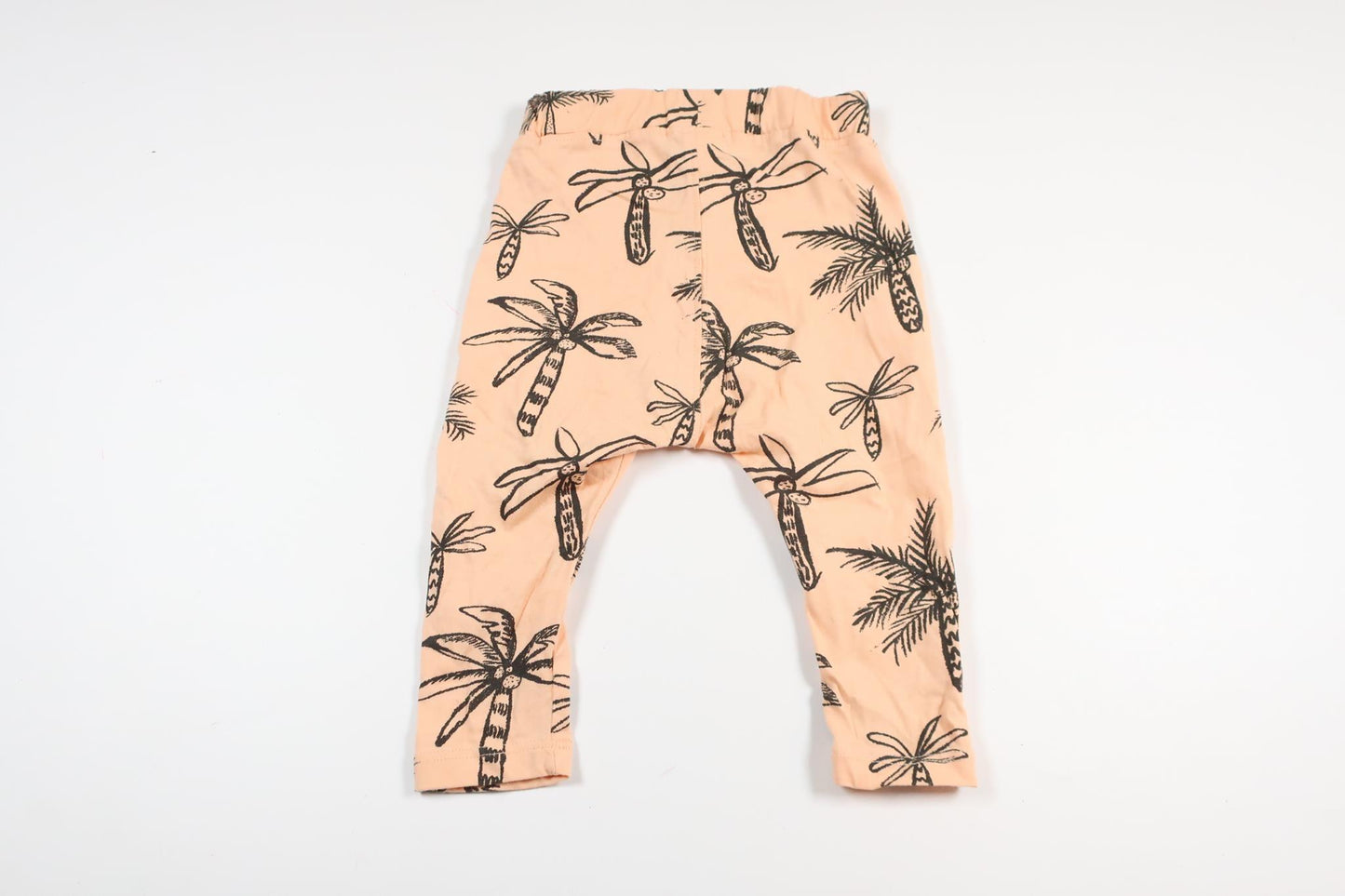 Pink trousers with palm trees from Lindex in size 68