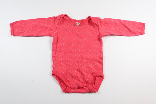 Neon pink polka dot long sleeve bodysuit from HEMA in size 50/56
