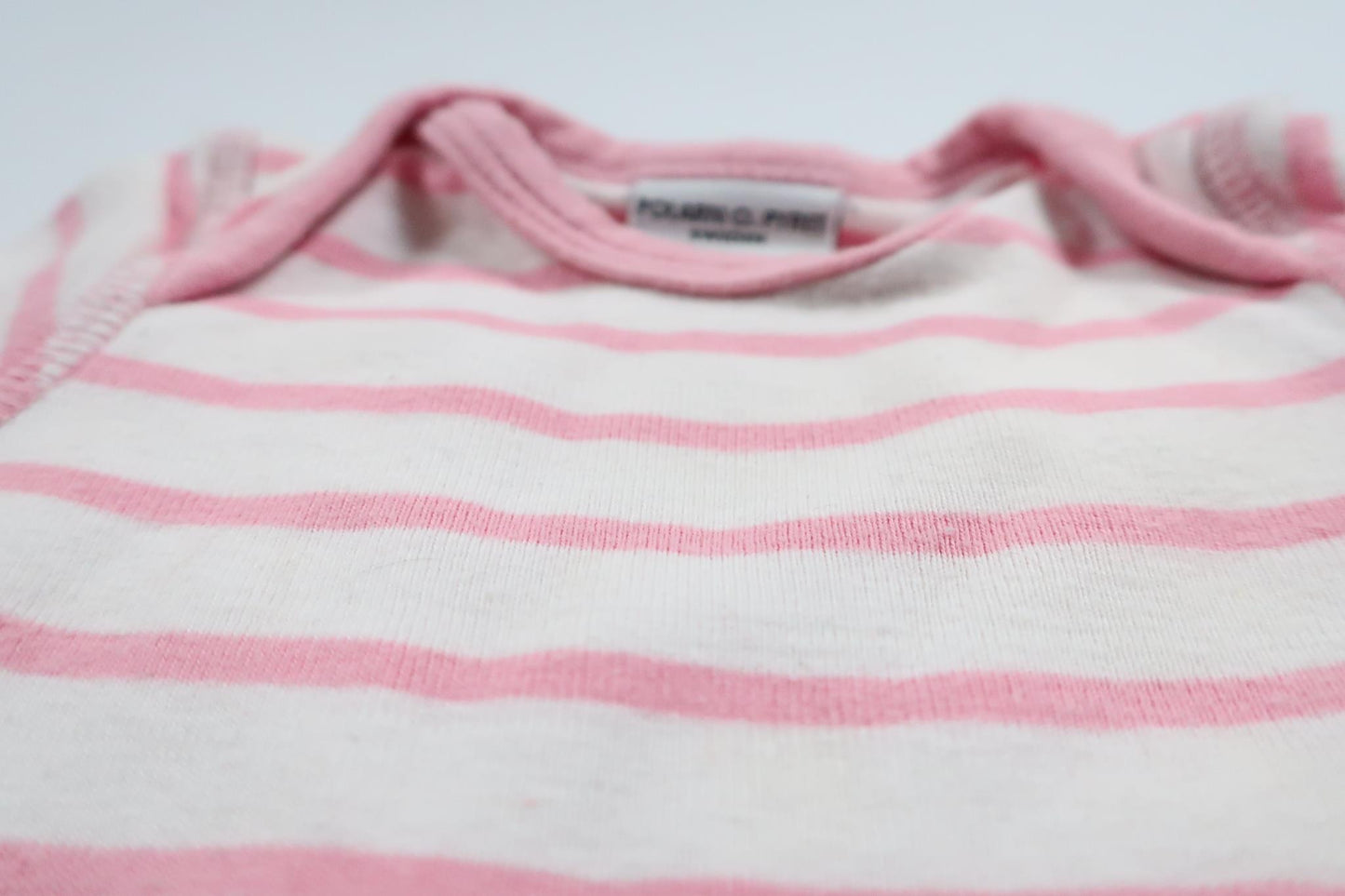 Pink and white striped short-sleeved bodysuit from Polarn O. Pyret in size 56