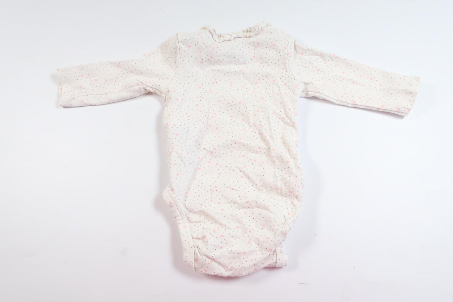 White long-sleeved bodysuit with hearts and dots from H&amp;M in size 50
