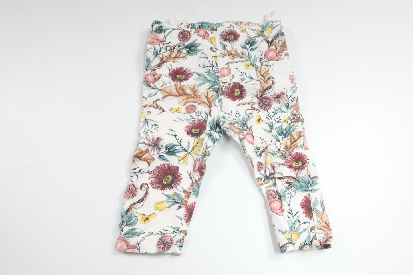 Floral trousers with ruffles from Lindex - Size 62 - White