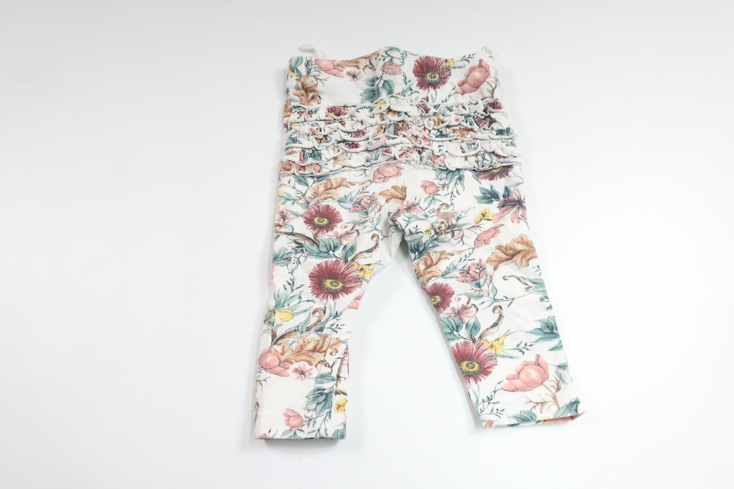 Floral trousers with ruffles from Lindex - Size 62 - White