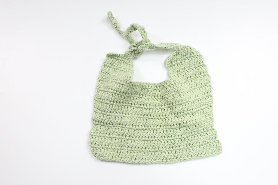 Knitted bib from Hemstickat - Size One size - Green