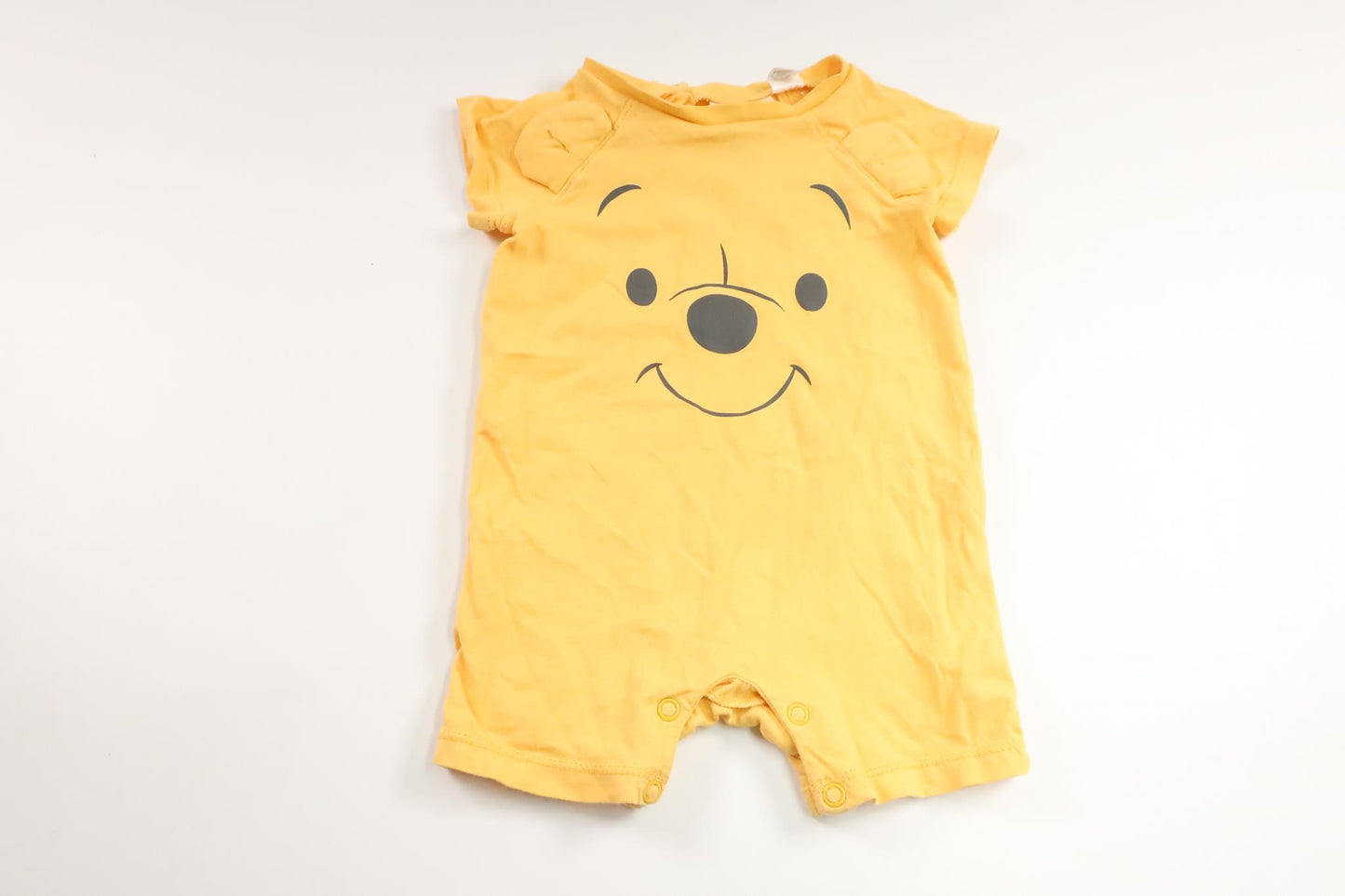 Jumpsuit mit Winnie Puuh-Motiv von H&MM - Größe 62 - Gelb