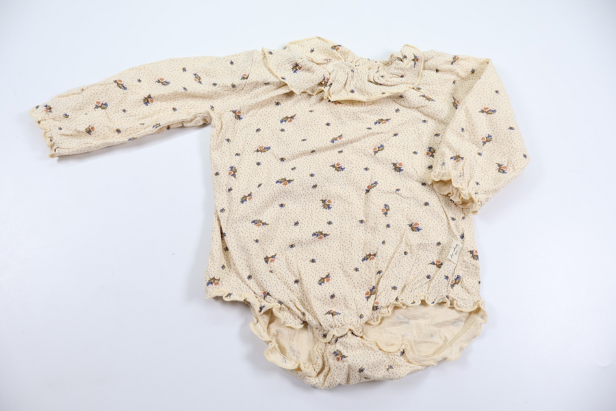 Floral body with ruffle from Kongens Slöjd - Size 74/80 - Beige