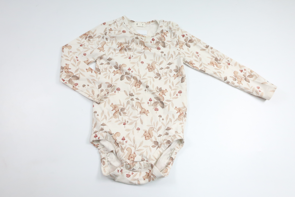Body von Newbie – Größe 86 – Cremeweiß