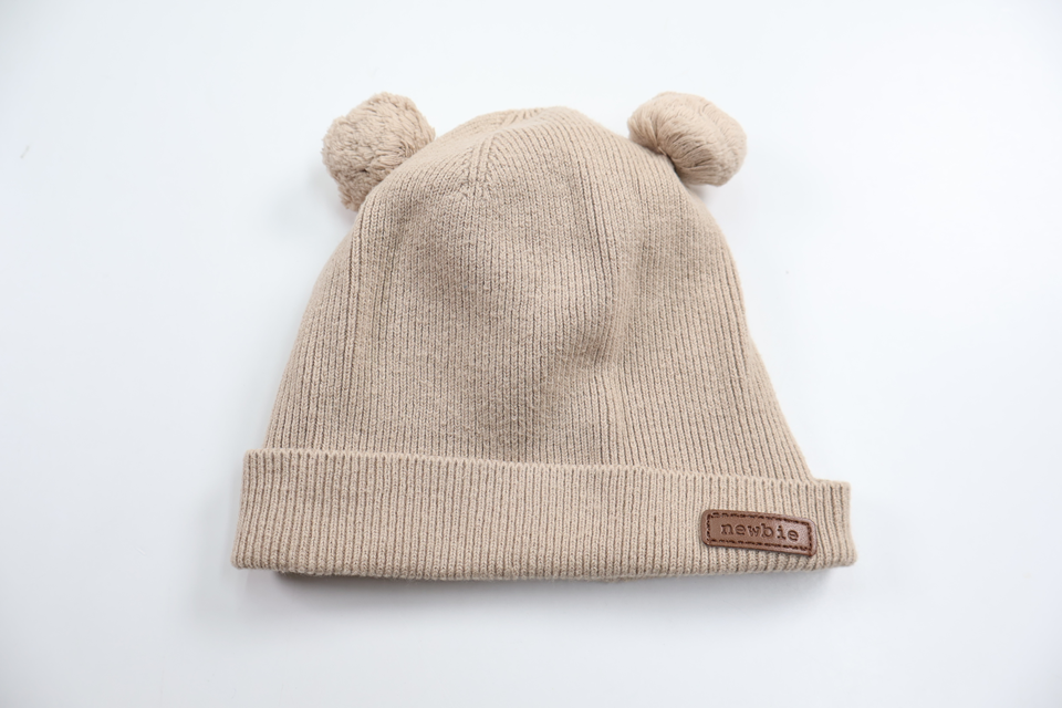 Mössa från Newbie - Storlek 44/46 - Beige