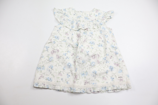 Blommig klänning från Newbie - Storlek 80 - Vit