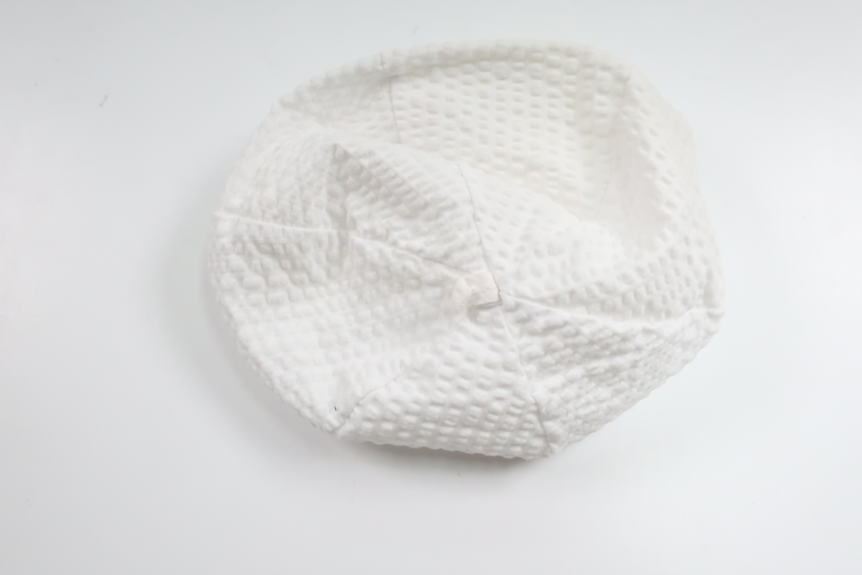 Mössa från Okänt - Storlek 56/62 - Vit
